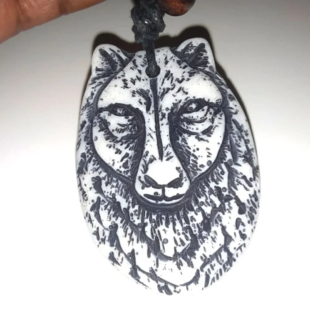Hand CRAFTED UNISEX wolf charm with adjustable necklace